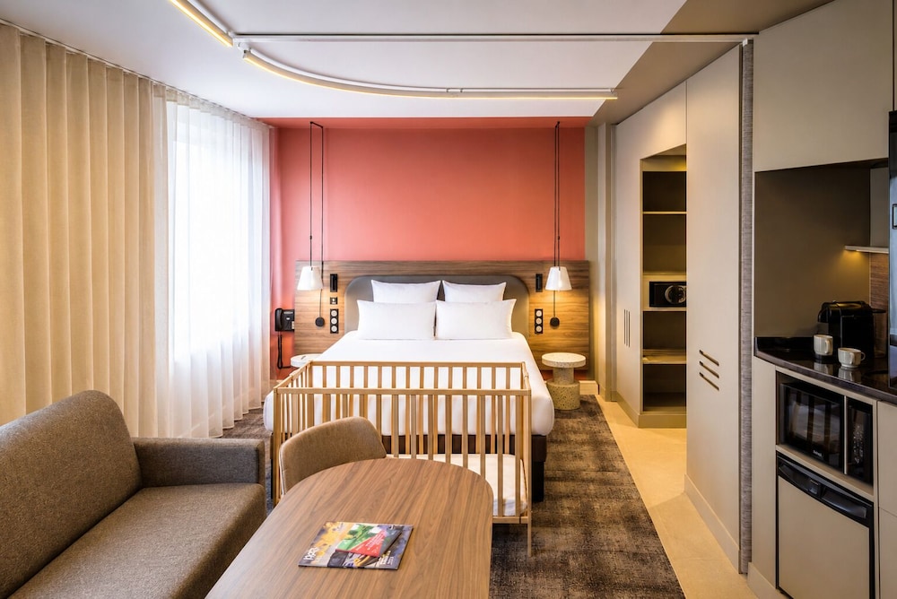 Suite superior, 1 cama de matrimonio con sofá cama del hotel Novotel Suites Rouen Normandie. Foto 5