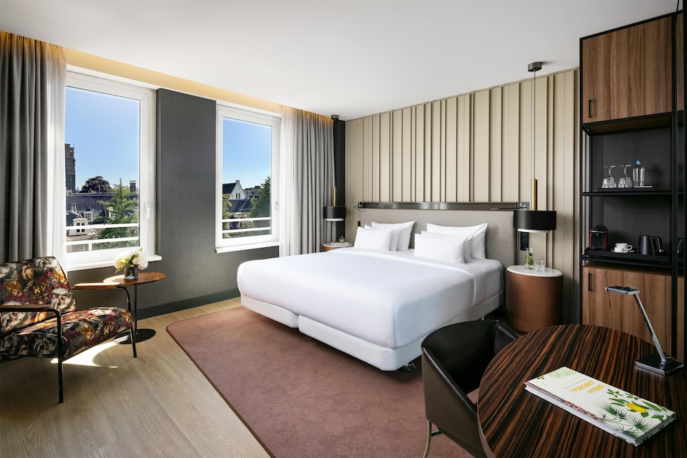 Habitación Premium (Extra Bed 2 adults + 1 child) del hotel Nh Collection Amsterdam Flower Market. Foto 7