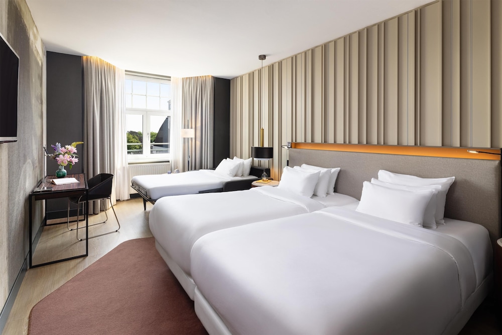 Habitación Premium (Extra Bed 2 adults + 1 child) del hotel Nh Collection Amsterdam Flower Market. Foto 14