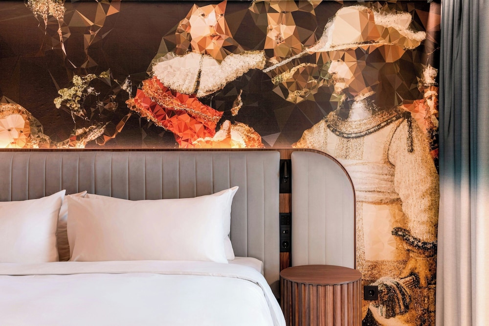 Habitación familiar, 1 cama de matrimonio grande con sofá cama del hotel Renaissance Amsterdam. Foto 5