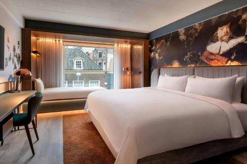 Habitación Triple con vistas a la ciudad del hotel Renaissance Amsterdam