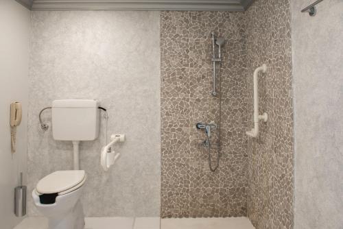 Habitación Doble con vistas a la montaña - 2 camas - Adaptada para personas con movilidad reducida del hotel Mitsis Selection Alila. Foto 1