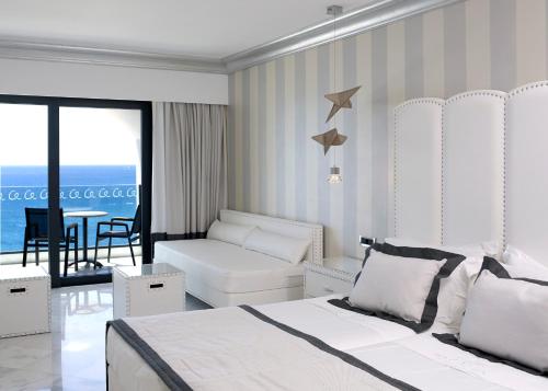 Habitación Doble Superior con vistas al mar - 2 camas del hotel Mitsis Selection Alila. Foto 2