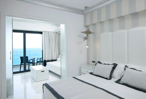 Habitación Familiar con vistas al mar del hotel Mitsis Selection Alila. Foto 1