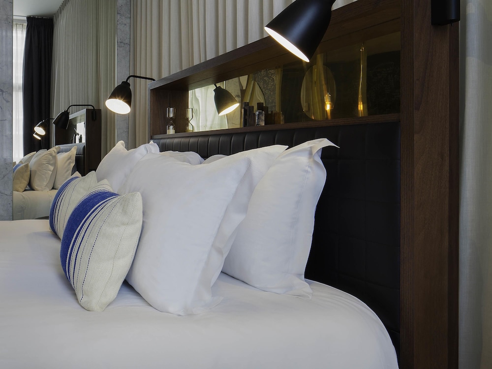 Junior suite 1 Cama king del hotel Ink Amsterdam - Mgallery. Foto 7