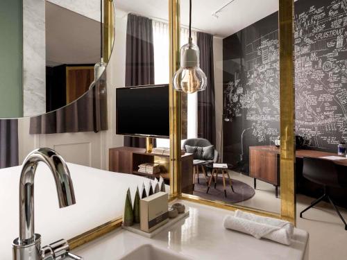 SUITE JUNIOR, 1 cama king - size del hotel Ink Amsterdam - Mgallery. Foto 5