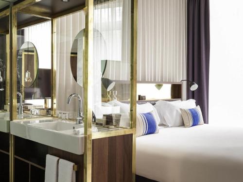 SUITE JUNIOR, 1 cama king - size del hotel Ink Amsterdam - Mgallery. Foto 7