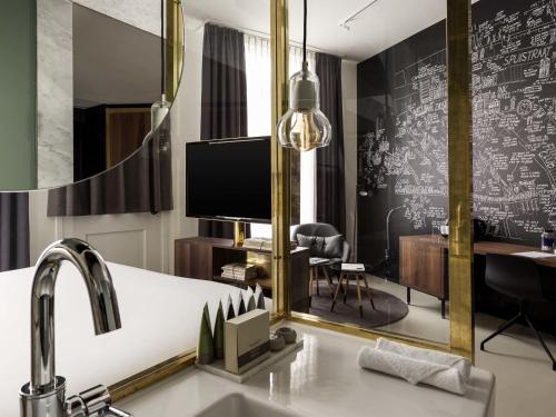 SUITE JUNIOR, 1 cama king - size del hotel Ink Amsterdam - Mgallery. Foto 8