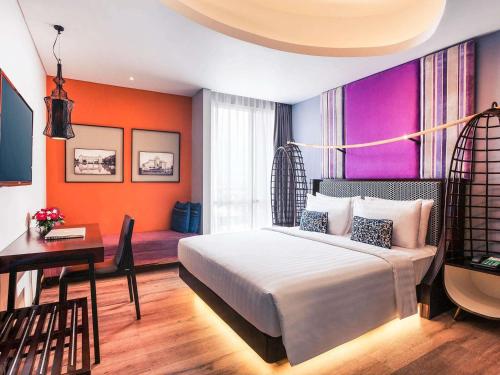 Habitación Clásica con cama extragrande del hotel Mercure Surabaya Grand Mirama