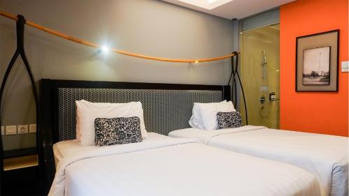 Habitación Doble Clásica - 2 camas del hotel Mercure Surabaya Grand Mirama. Foto 3
