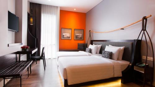Habitación Doble Clásica - 2 camas del hotel Mercure Surabaya Grand Mirama. Foto 6