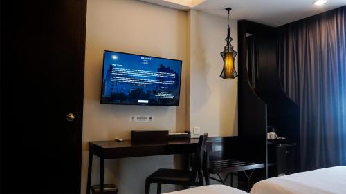 Habitación Doble Clásica - 2 camas del hotel Mercure Surabaya Grand Mirama. Foto 7