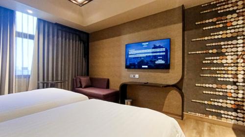 Privilege Twin Room with City View del hotel Mercure Surabaya Grand Mirama. Foto 2