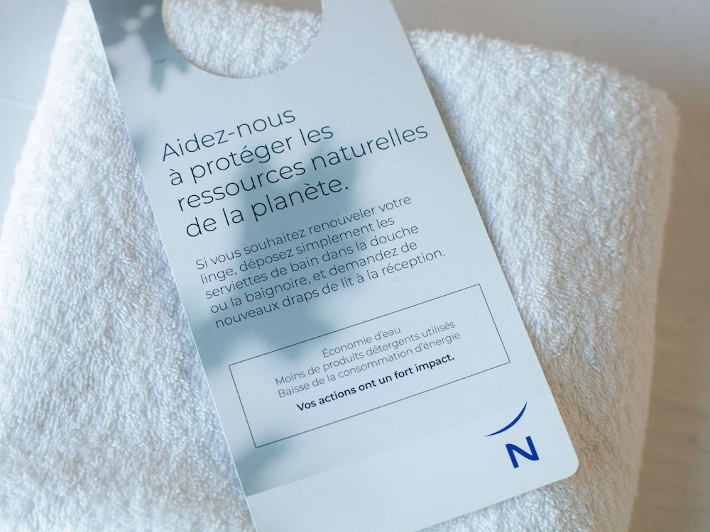 Suite familiar, varias camas del hotel Novotel Suites Paris Issy Les Moulineaux. Foto 5