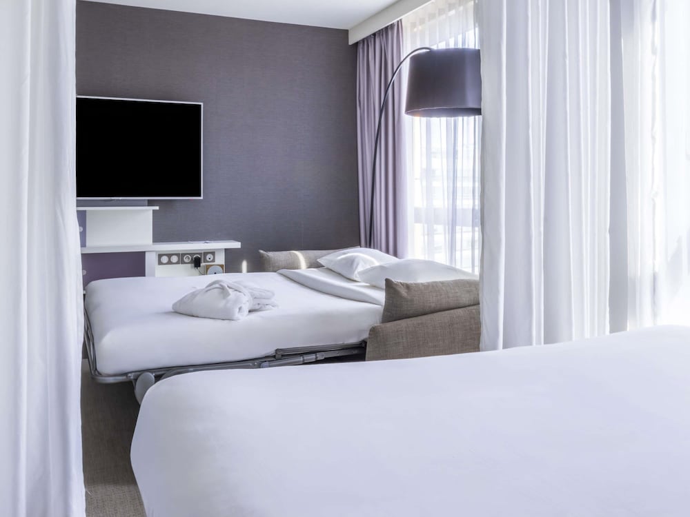 Habitación ejecutiva, 1 cama doble con sofá cama del hotel Novotel Suites Paris Issy Les Moulineaux. Foto 7