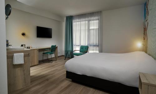 Habitación Doble City del hotel Inntel Hotels Amsterdam Centre. Foto 3