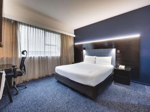 Habitación Estándar con 1 Cama Queen del hotel Mercure Wellington Abel Tasman. Foto 4