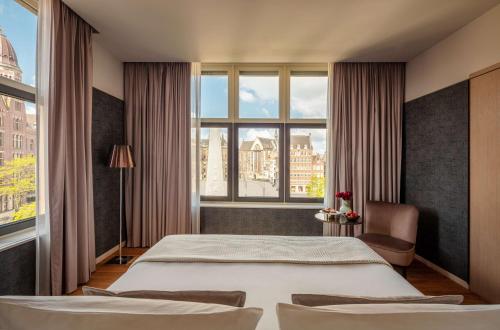 Suite Royal con vistas a la presa del hotel Anantara Grand Hotel Krasnapolsky Amsterdam. Foto 3