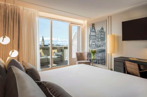 Habitación Ejecutiva con Terraza en la Azotea del hotel Anantara Grand Hotel Krasnapolsky Amsterdam. Foto 3