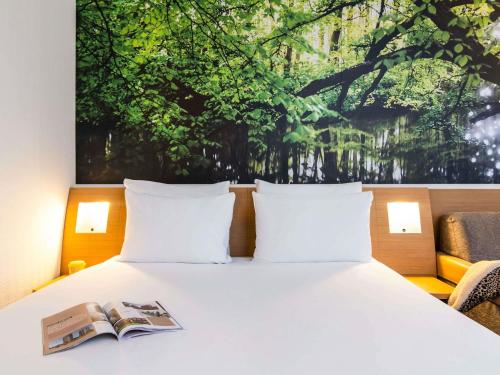 Habitación Estándar - 1 cama grande del hotel Novotel Amsterdam City. Foto 1