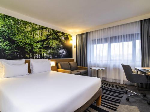 Habitación Estándar - 1 cama grande del hotel Novotel Amsterdam City. Foto 1