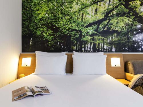 Habitación Estándar - 1 cama grande del hotel Novotel Amsterdam City. Foto 2