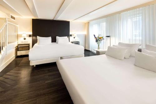 Habitación Familiar del hotel Nh Collection Amsterdam Barbizon Palace. Foto 2