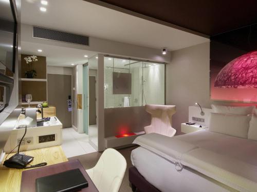 Habitación Deluxe - 1 cama grande del hotel Pullman Eindhoven Cocagne. Foto 1