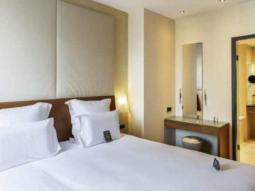 Suite Superior con cama extragrande del hotel Pullman Eindhoven Cocagne. Foto 1