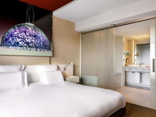 Suite Executive - Cama extragrande del hotel Pullman Eindhoven Cocagne. Foto 4