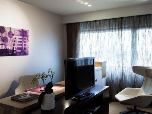 Habitación Executive con cama extragrande del hotel Pullman Eindhoven Cocagne. Foto 3