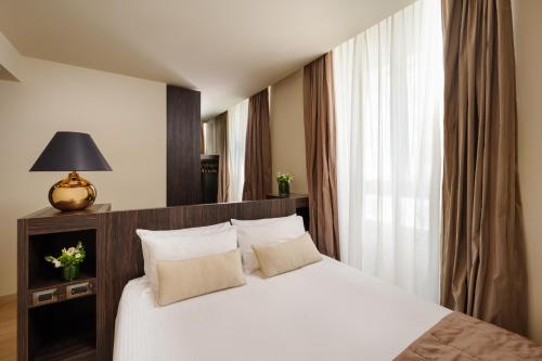 Habitación Individual Deluxe del hotel The Square Milano Duomo. Foto 5