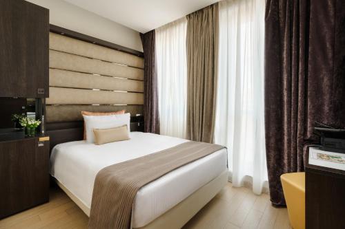 Habitación Individual Deluxe del hotel The Square Milano Duomo. Foto 6