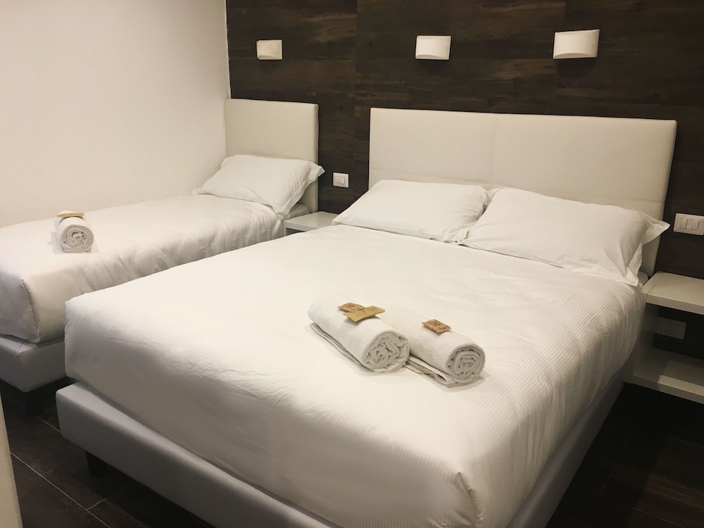 Habitación triple del hotel Aurum Firenze