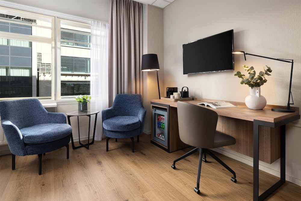 Habitación Triple Estándar del hotel Nh Atlanta Rotterdam. Foto 7