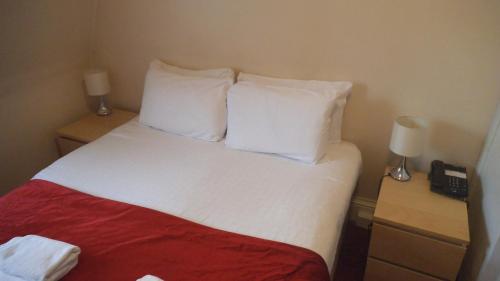 Habitación Triple del hotel Arran House. Foto 1