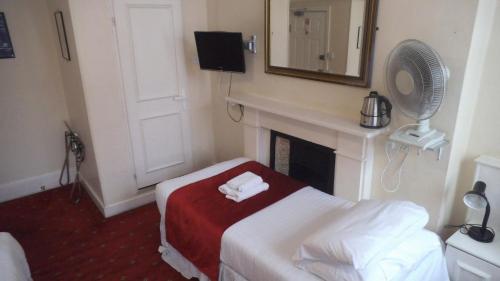 Habitación Triple del hotel Arran House. Foto 5
