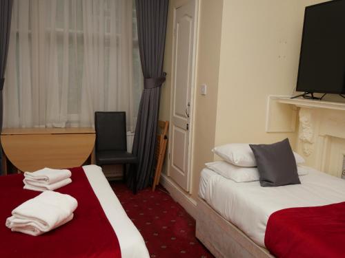 Habitación Triple del hotel Arran House. Foto 6
