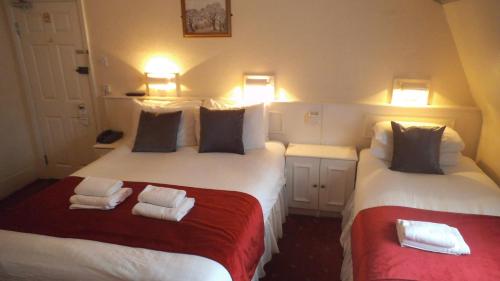 Habitación cuádruple del hotel Arran House. Foto 6