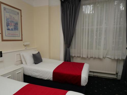 Habitación cuádruple del hotel Arran House. Foto 9