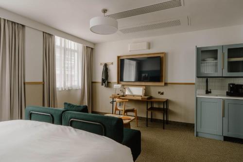 Habitación Estándar - 1 cama grande del hotel Club Quarters London City. Foto 6