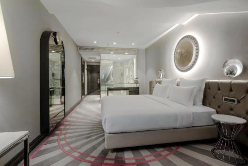 Habitación Doble Deluxe - 2 camas - Ático del hotel Sura Design & Suites. Foto 4
