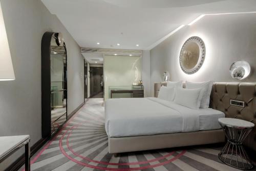Habitación Doble Deluxe - 2 camas - Ático del hotel Sura Design & Suites. Foto 6
