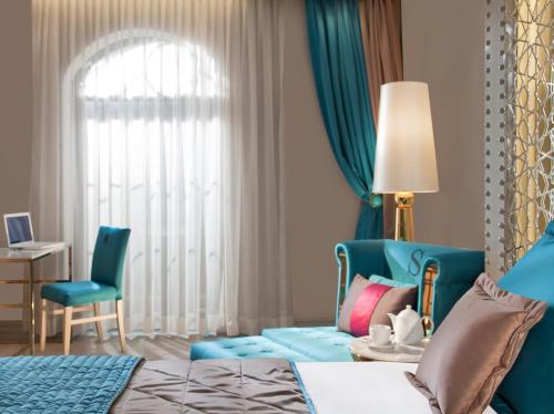 Habitación Doble Deluxe del hotel Sura Design & Suites. Foto 1
