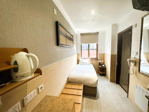 Habitación Individual del hotel Eurotraveller Express. Foto 1