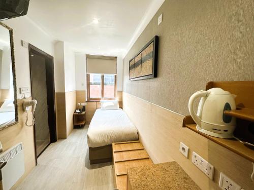 Habitación Individual del hotel Eurotraveller Express. Foto 2