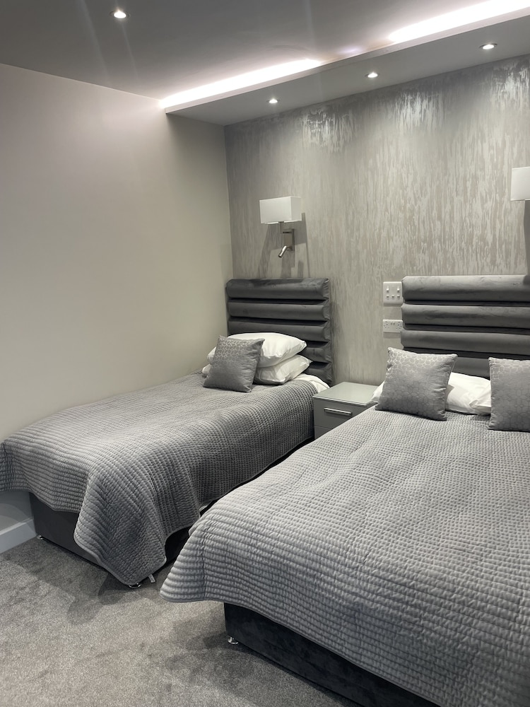 Habitación triple clásica del hotel Park Avenue