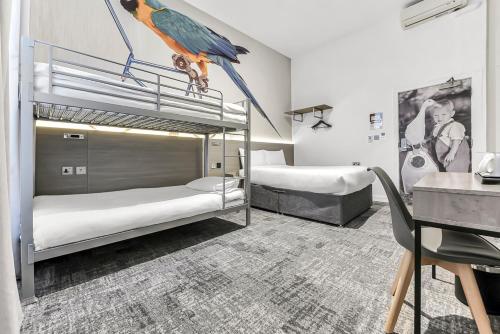 Habitación Familiar del hotel Heeton Concept Kensington. Foto 9