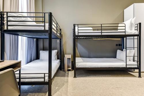 Habitación Cuádruple Superior del hotel Heeton Concept Kensington. Foto 1