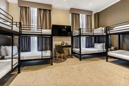 Habitación Cuádruple Superior del hotel Heeton Concept Kensington. Foto 2